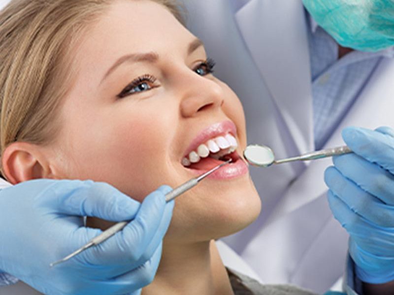 patient receiving tooth whitening treatment